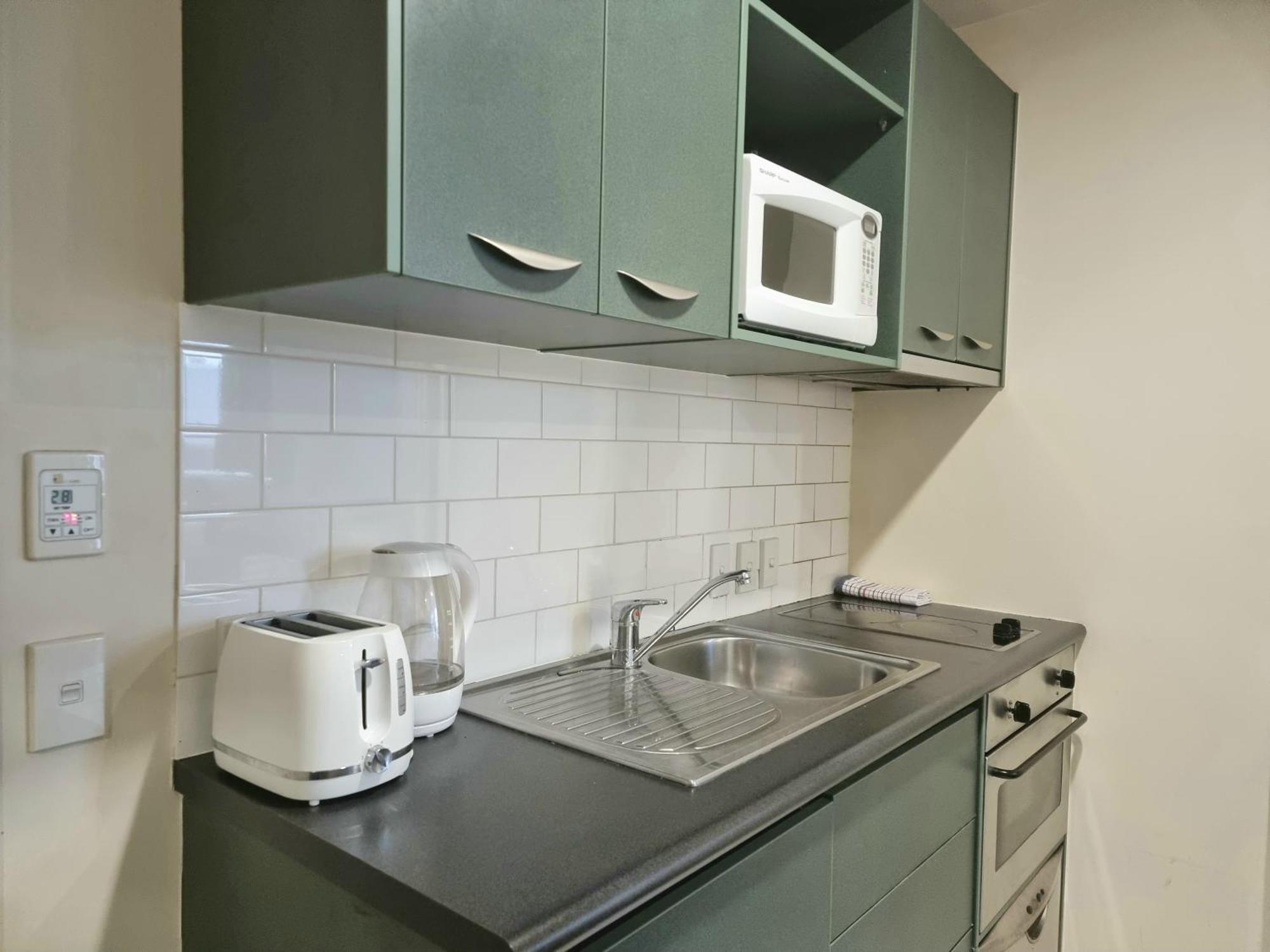 Urban Deco Apartment On Queen Street Auckland Rum bild